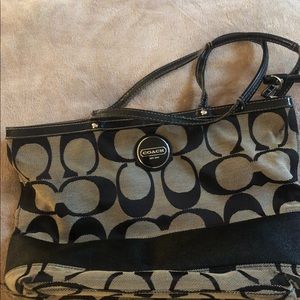Coach bag.  Fair condition. Only Handles are in poor shape.